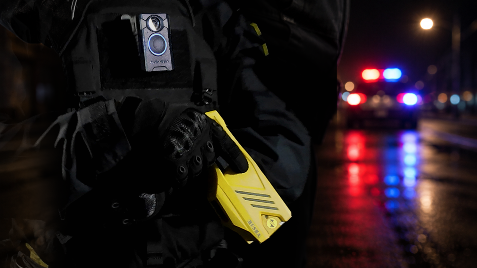 Law enforcement officer equipped with HUSHA body-worn camera and non-lethal device